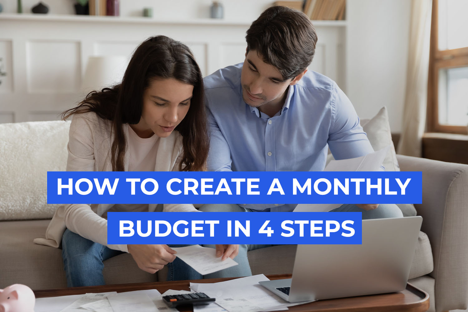 a man setting besides a woman with a laptop and papers from how to create a monthly budgeting article on 3elm El geib